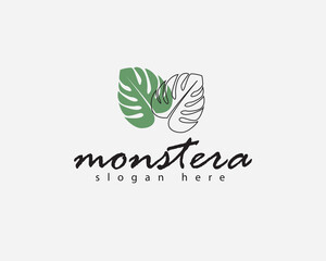 creative two monstera leaves with one striped and one green logo design