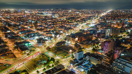 Aerial Night View of Bogotá: Vibrant City Lights and Modern Architecture in Colombia