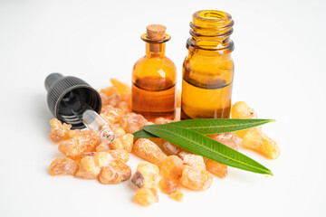 Frankincense or olibanum aromatic resin isolated on white background used in incense and perfumes.