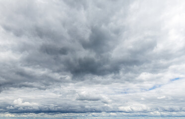 Sky replacement clouds puffy gray and white with blue sky