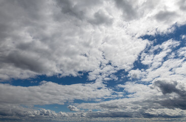 Sky replacement clouds puffy gray and white with blue sky