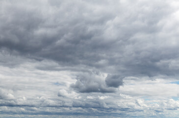 Sky replacement clouds puffy gray and white with blue sky