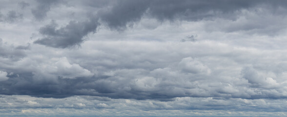 Sky replacement clouds puffy gray and white with blue sky