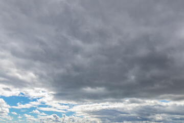 Sky replacement clouds puffy gray and white with blue sky