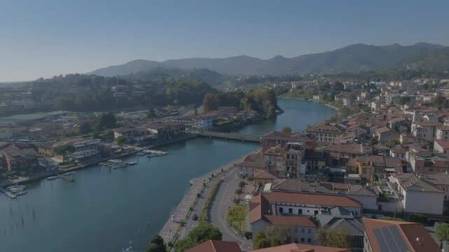 filming over the town of Sarnico, Bergamo, and Paratico Brescia on Lake Iseo in a sunny day.
Oglio river Bridge
