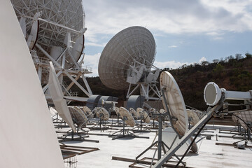 giant satellite antenna telecommunications band c, in top of the mountain hill