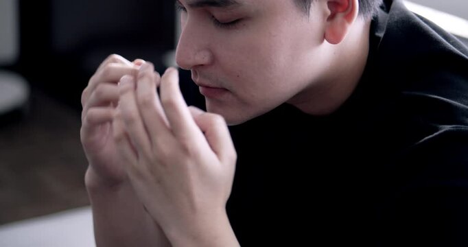 Struggling with stress a young man's emotional turmoil indoor setting portrait contemplative mood mental health awareness
