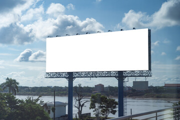 Blank billboard mockup on blue sky background for new advertisement. Mock up