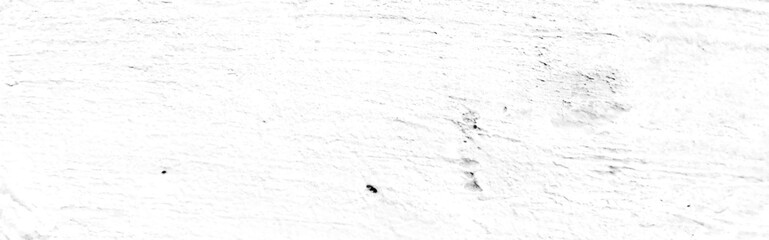 White old concrete wall grunge texture - wide banner format background with copy space for text. Grunge gray texture of chips, cracks, scratches. Soft white grunge. Distressed black grunge texture.