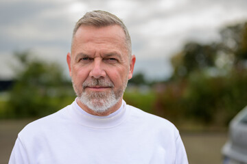Portrait of a Mature Man with a Serious Expression