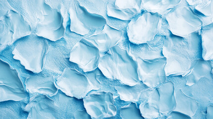 Obraz premium Soft blue textured surface created by layered paint resembling petals on canvas