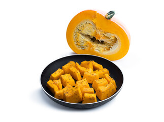 Raw pumpkin slices with herbs isolated on white. Ready for baking