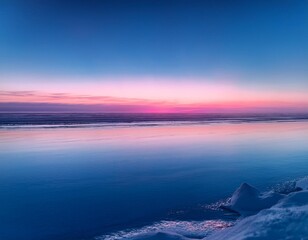 Fototapeta premium A magical winter landscape with a colorful sky and a tranquil frozen lake