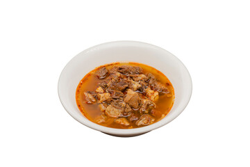 Meat soup typical of Turkish cuisine served in a bowl isolated on a white background.
