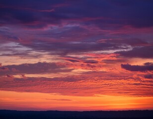 Obraz premium A picturesque sunset captures the beauty of nature's evening spectacle