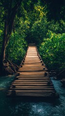 A wooden bridge leads through lush greenery, inviting exploration of nature's tranquility.