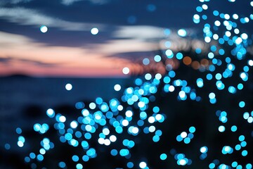 Fototapeta premium Luminous Blue Sparkling Bokeh Effect in Twilight