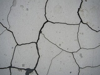 Obraz premium cracked concrete surface covered in grime and stains, gritty