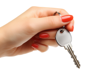 Hand holding a key on a keyring.