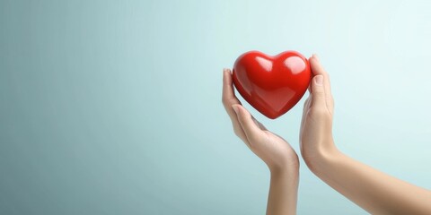 Hands Holding Red Heart Concept of Health Care Love Donation Wellbeing Support and Compassion on Blue Background
