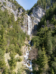 dalfazer waterfall during Spring time with deep blue background sky