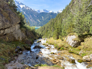 dalfazer waterfall during Spring time with deep blue background sky