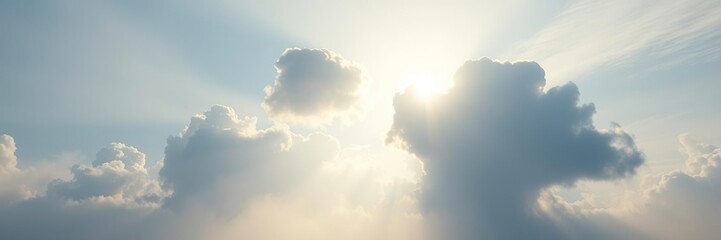 Obraz premium The sun shines through the misty veil of clouA group of clouds drift lazily across the sky their shapes morphing into animals and objects, cloud formations, weather phenomenon, wispy clouds