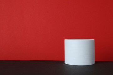 White podiums on color background 