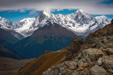 Stunning Snow-Capped Mountain Ranges with Rugged Rocky Outcrops