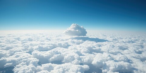 Naklejka premium A lone cloud breaks through the sea of white clouds casting a shadow on the earth below, cloudscape, wispy, driftwood