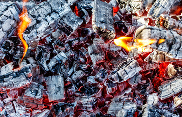 A pile of wood that is on fire