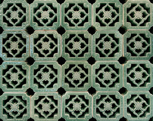 Close up pattern of moulded clay or ceramic latticework, or simply called as Roster, in flower...