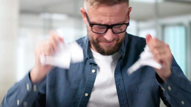 Shocked Businessman Tearing Bill Document