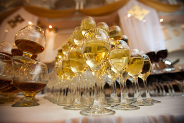 Glasses of drinks stand on the table