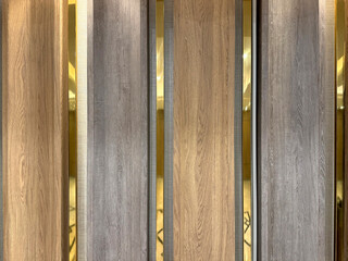 Series of curved moulded wood panel texture with golden tinted mirrors. Different wood tone color,...