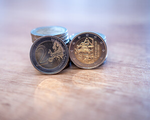 Coins with a nominal value of 2 euros are made of two alloys, the outer part is made of medinickel...