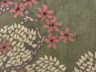 Random texture of custom bespoke carpet rug design, in flower, leaves, and trees branches pattern....