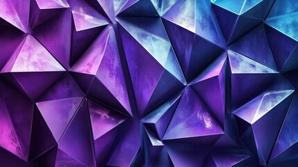Fototapeta premium Abstract geometric background with purple and blue triangular shapes.