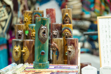 Selling Of African Souvenirs on A Stall At The Market On Blurred Background