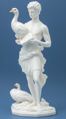 A white statue of a young man holding a goose, symbolizing nature and artistry.