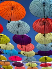 Obraz premium colorful umbrellas in the sky