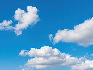 Obraz premium Puffy and irregularly shaped clouds resembling a Samoyed's coat, scattered across the clear blue sky, white, puffy, animal shape