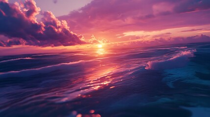 Obraz premium Pink Sunset Over Ocean Waves Displaying Beautiful Colors