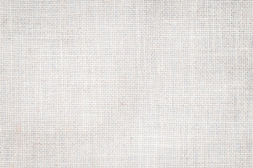 White hessian sackcloth woven with jute burlap cotton fabric cloth textile texture pattern background in white light color