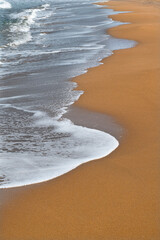  Cyprus Alagadi Turtle Beach. View from the beach to the sea. Magnificent beach, sea and blue cloudy sky. Yellow sand beach.