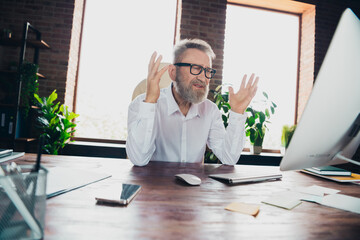 Photo of stressed depressed man banker economist dressed shirt working modern gadget indoors...