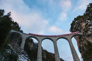 Red Express in the Landwasser Viaduct Photo, Filisur Switzerland