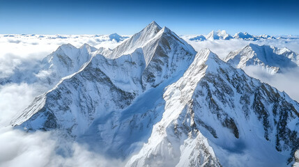Obraz premium A winter mountain range with snow-covered peaks viewed from above.