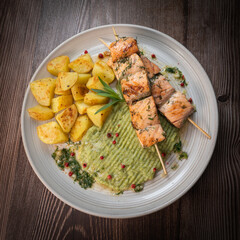Barbecued salmon skewer with potatoes and broccoli Puree, High quality photo