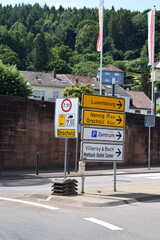 many signs at a bridge with weight limit